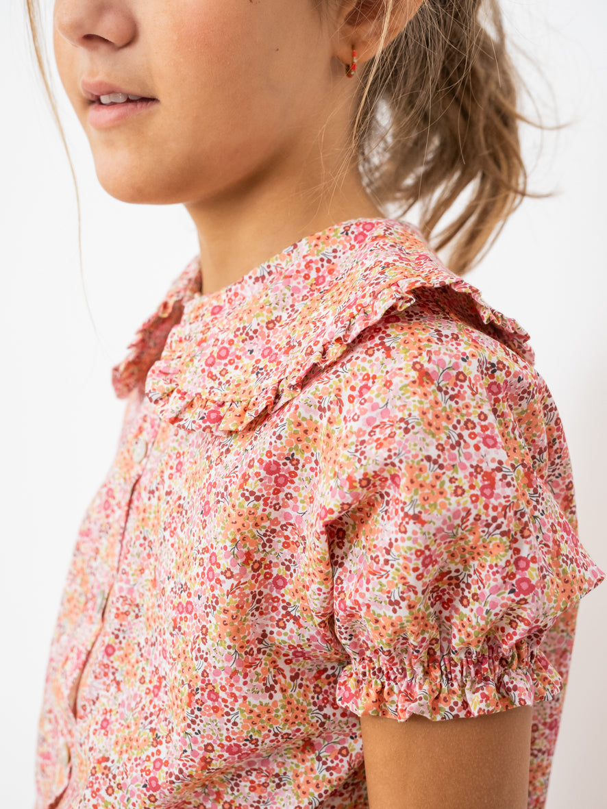 Blusa flores cuello